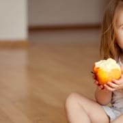 child with apple