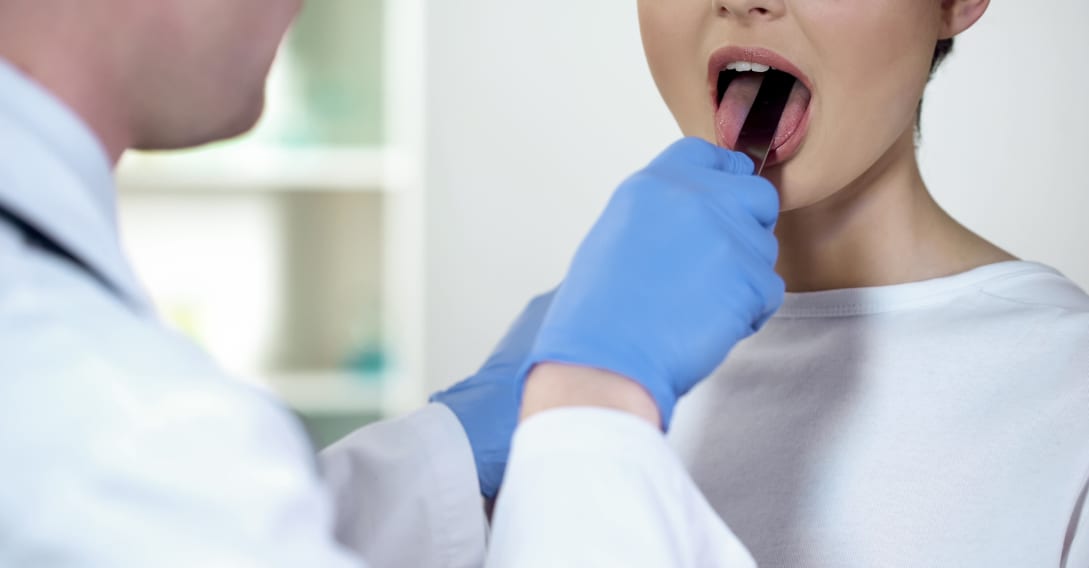 child getting throat swab