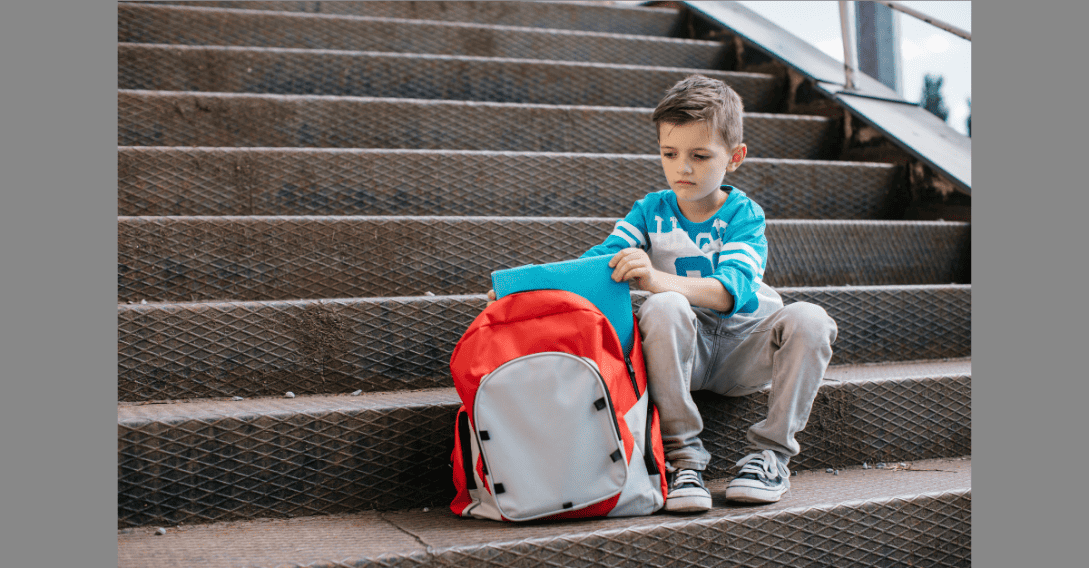 school boy on steps